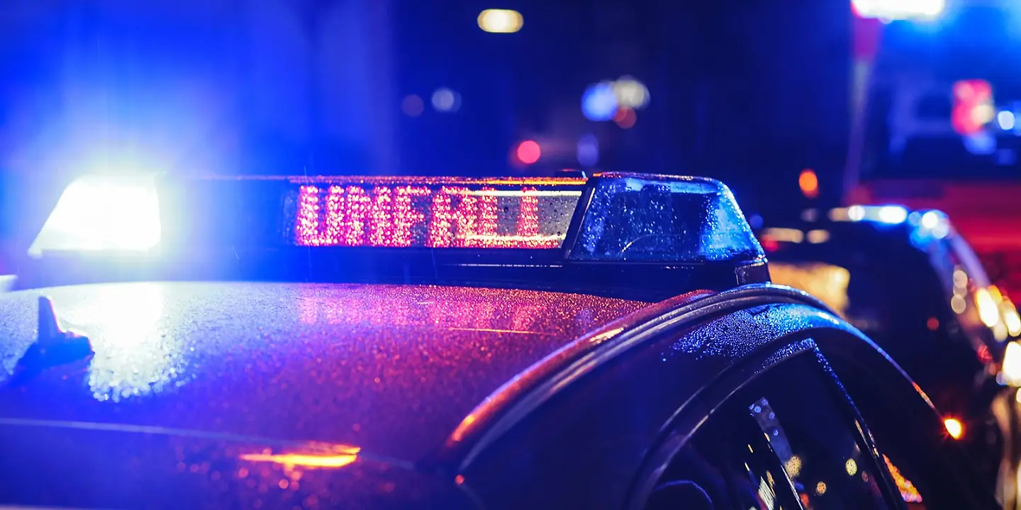 Police car with emergency shield on the roof